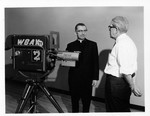 Father Gosz visits WBAY-TV in March 1967 by St. Norbert Abbey